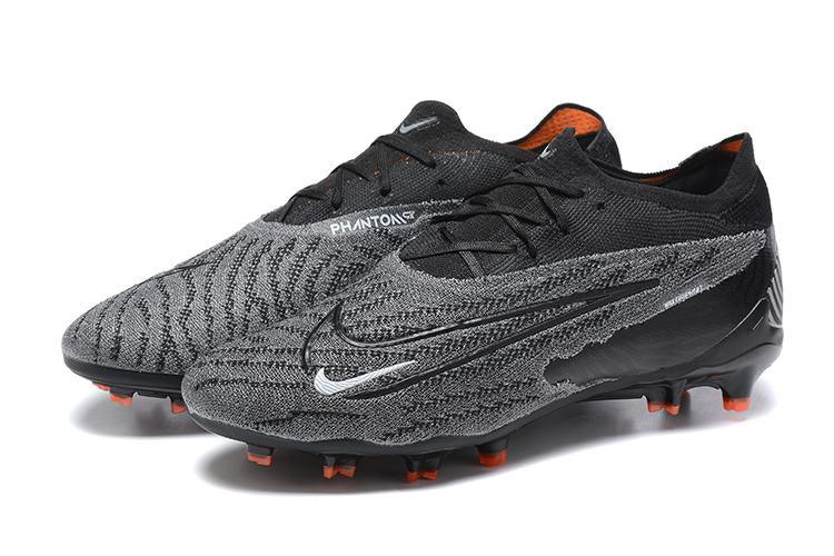 Chuteira Nike Phantom GX Low Elite FG Campo